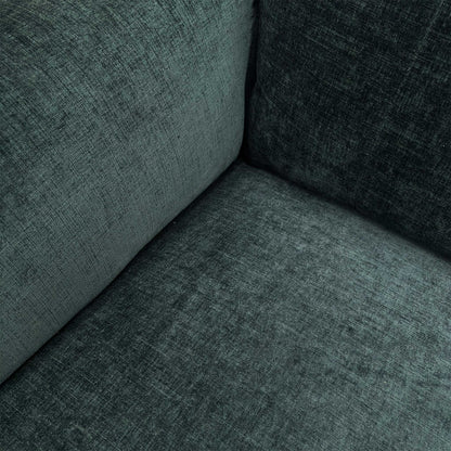 Close-up of the Forest Green linen-style fabric, highlighting the textured weave and the high-quality stitching on the armrests.