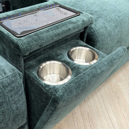 Detail shot of the central console, showing the stainless steel cup holders and the lift-up lid for the internal storage compartment.