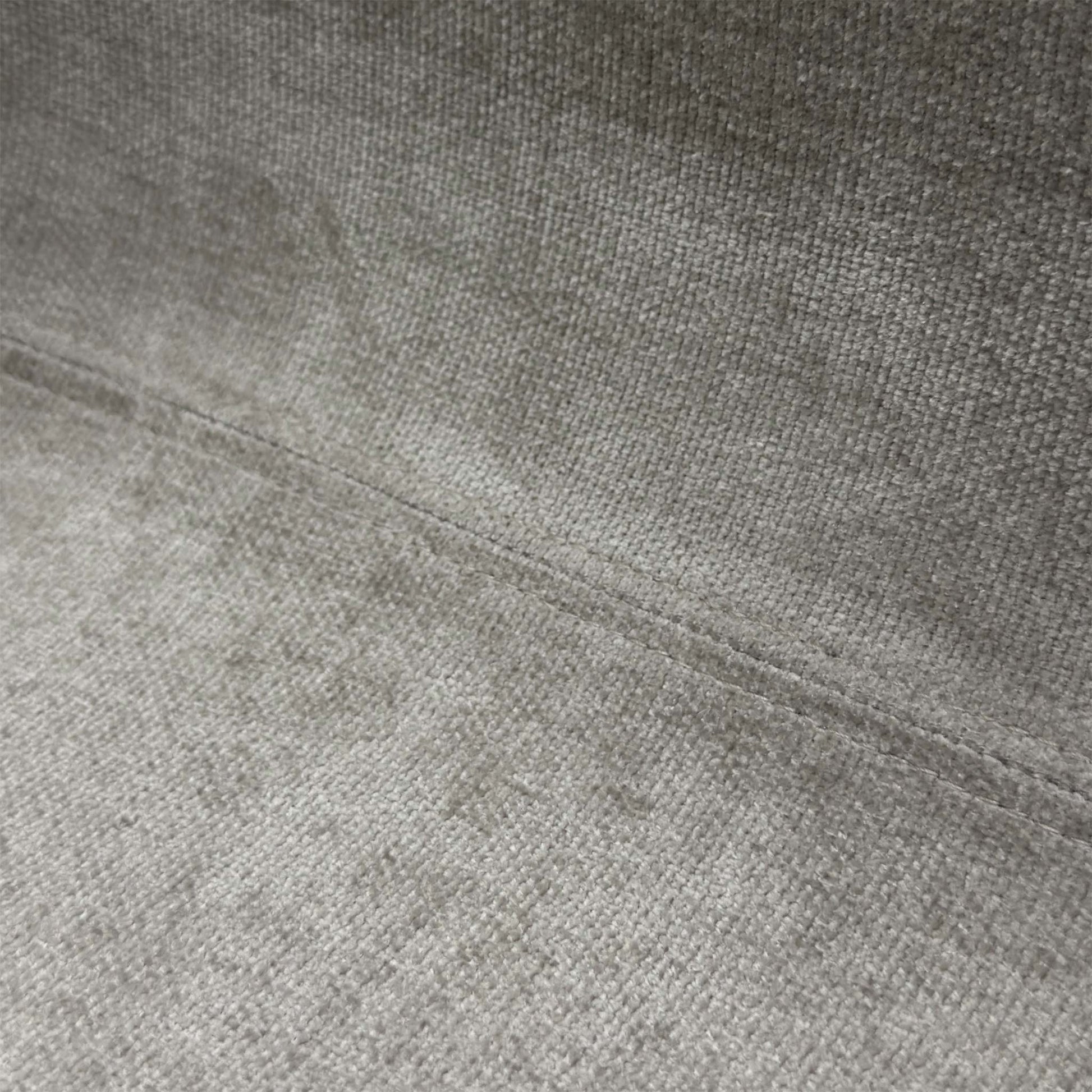Close-up detail of the premium upholstered fabric on the Stockholm chair, showcasing the quality finish and texture of the material.