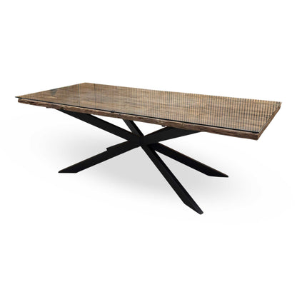 Angled perspective view of the Kiara dining table, emphasizing the ample surface area for large family gatherings and dinner parties.