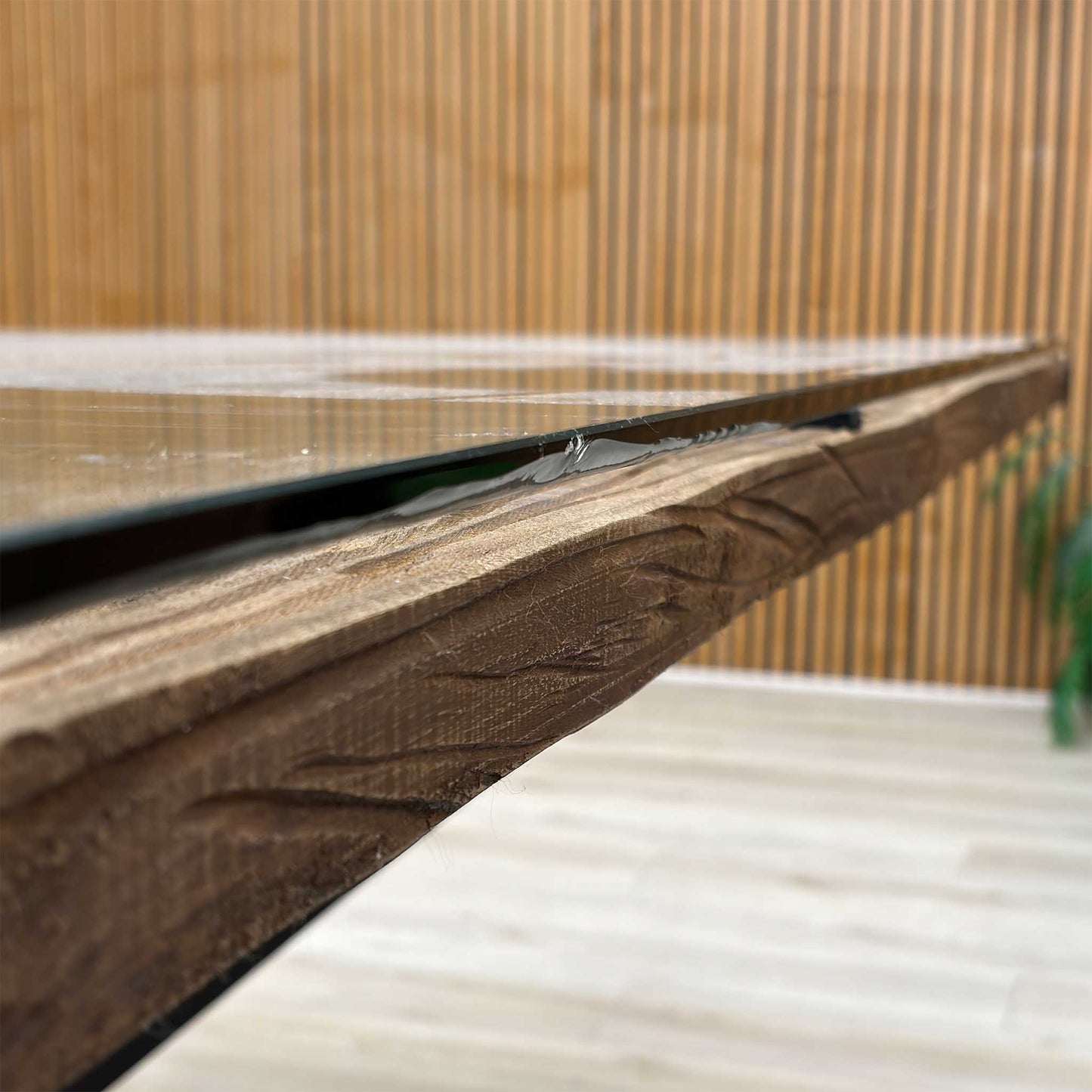 Close-up shot of the natural wooden tabletop, highlighting the rich organic grain patterns, smooth finish, and premium craftsmanship.