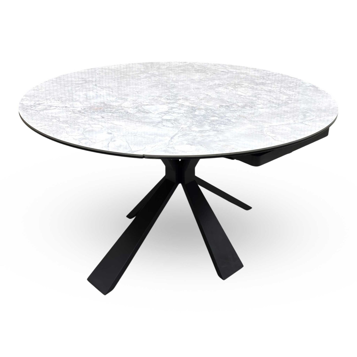 Top view of the ‘Crete’ Round Swivel Extending Table, showing the effortless rotating mechanism that reveals the extension leaves to create an oval shape.