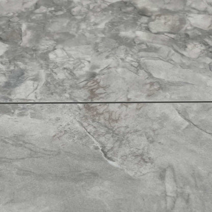 Close-up of the black metal pedestal base, detailing the architectural cross-frame design that provides maximum legroom and stability.