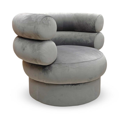 Full view of the Fitzrovia Accent Chair in Charcoal Velvet, featuring a classic tub-style silhouette with vertical channel tufting and gold-tipped black legs.