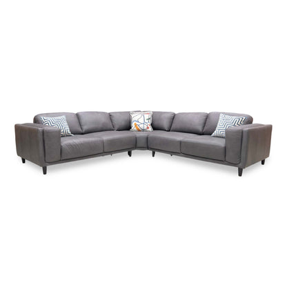 Full view of the Brody Large Corner Sofa upholstered in premium Grey Italian Leather, featuring a sleek modern design with polished chrome-finished metal feet.