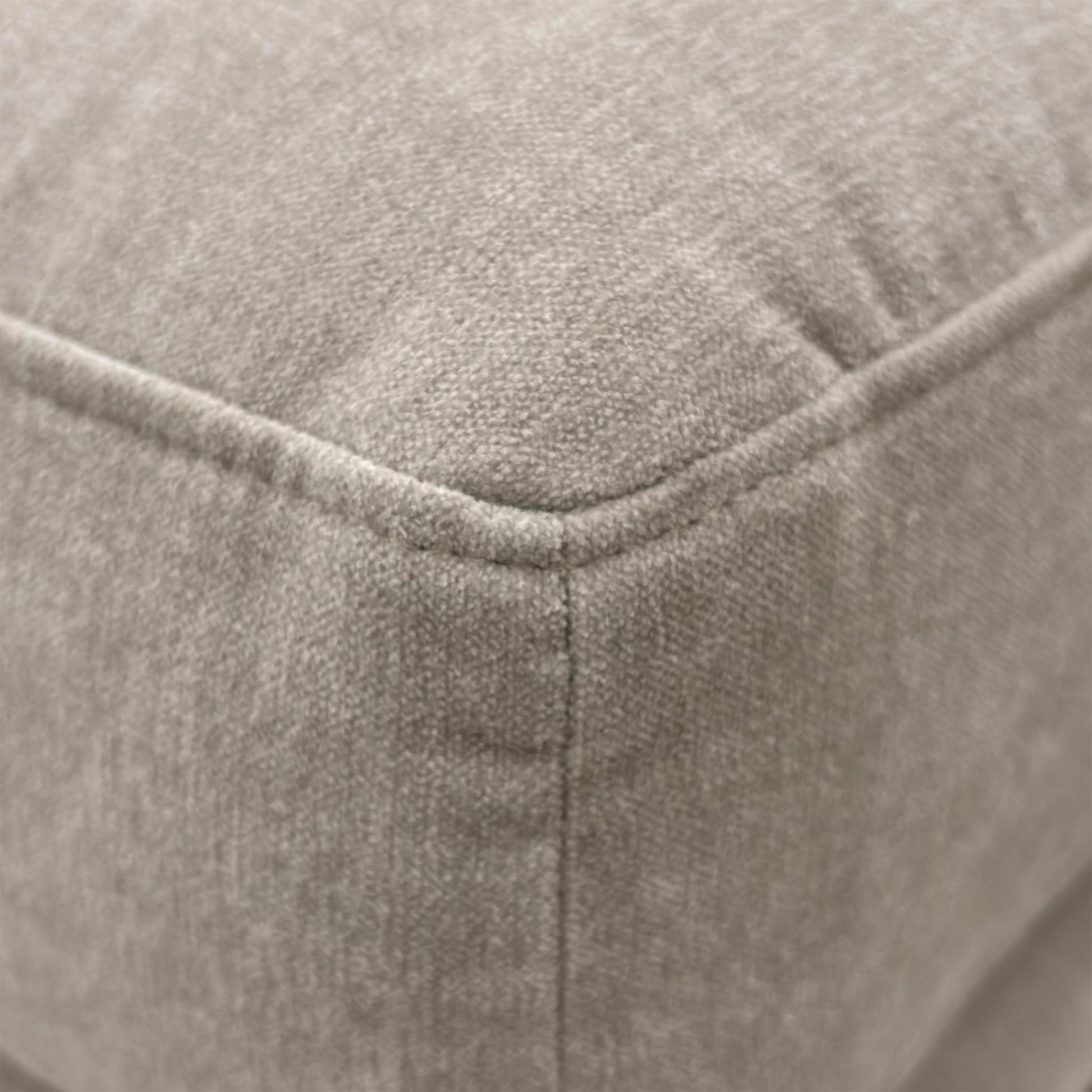 Close-up of the Taupe fabric upholstery on the Brixton sofa, showcasing the soft-touch woven texture and durable finish.