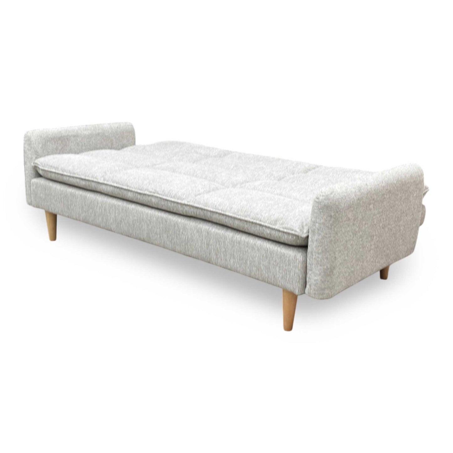 Side profile of the Chill sofa, emphasizing the sleek, low-profile design and the sturdy angle of the natural wood supporting legs.
