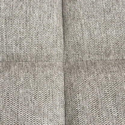 Close-up shot of the natural-toned fabric, highlighting the durable weave texture and the refined vertical channeled stitching on the backrest.