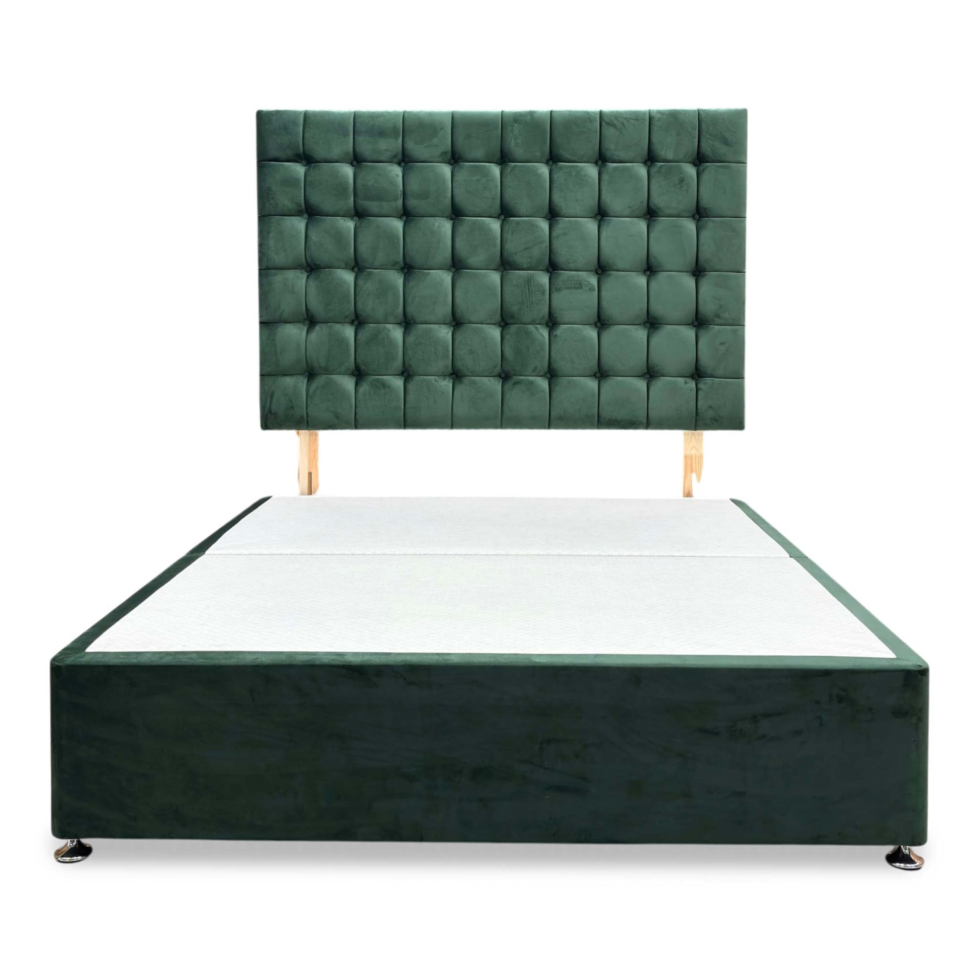 Front view of the ‘Dice’ emerald green velvet headboard, highlighting its premium tufted or padded geometric grid detailing and luxurious fabric sheen.
