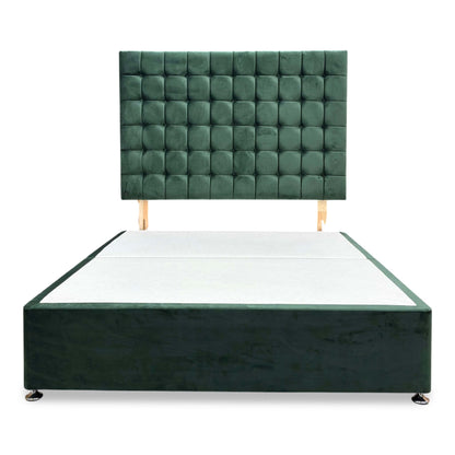 Front view of the ‘Dice’ emerald green velvet headboard, highlighting its premium tufted or padded geometric grid detailing and luxurious fabric sheen.