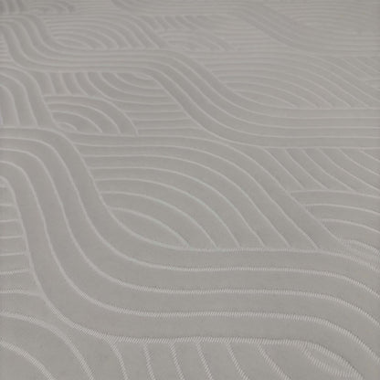 Close-up macro shot of the mattress surface, highlighting the luxurious, breathable top cover weave and cooling ventilation mesh along the sides.