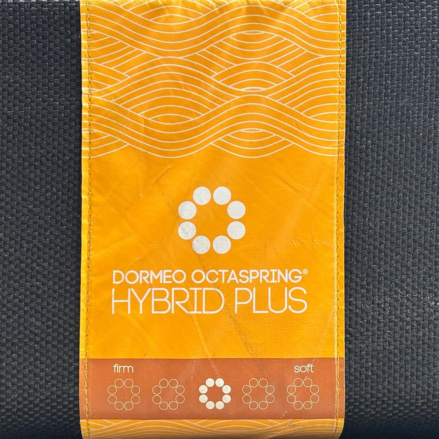 Detail shot showing the responsive flexibility and airflow design of an individual Octaspring foam coil, illustrating how it circulates air to regulate sleep temperature.