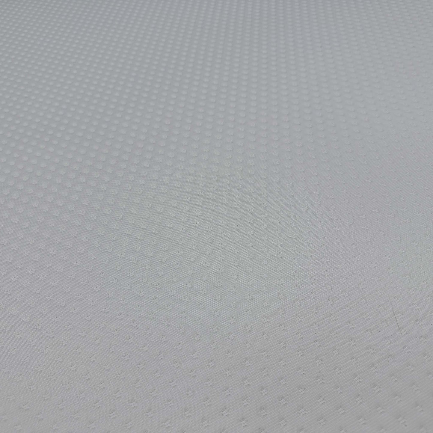 High-definition close-up macro view of the hypoallergenic temperature-regulating top cover fabric, detailing the advanced knitted textile patterns, breathable weave, and soft-touch texture.