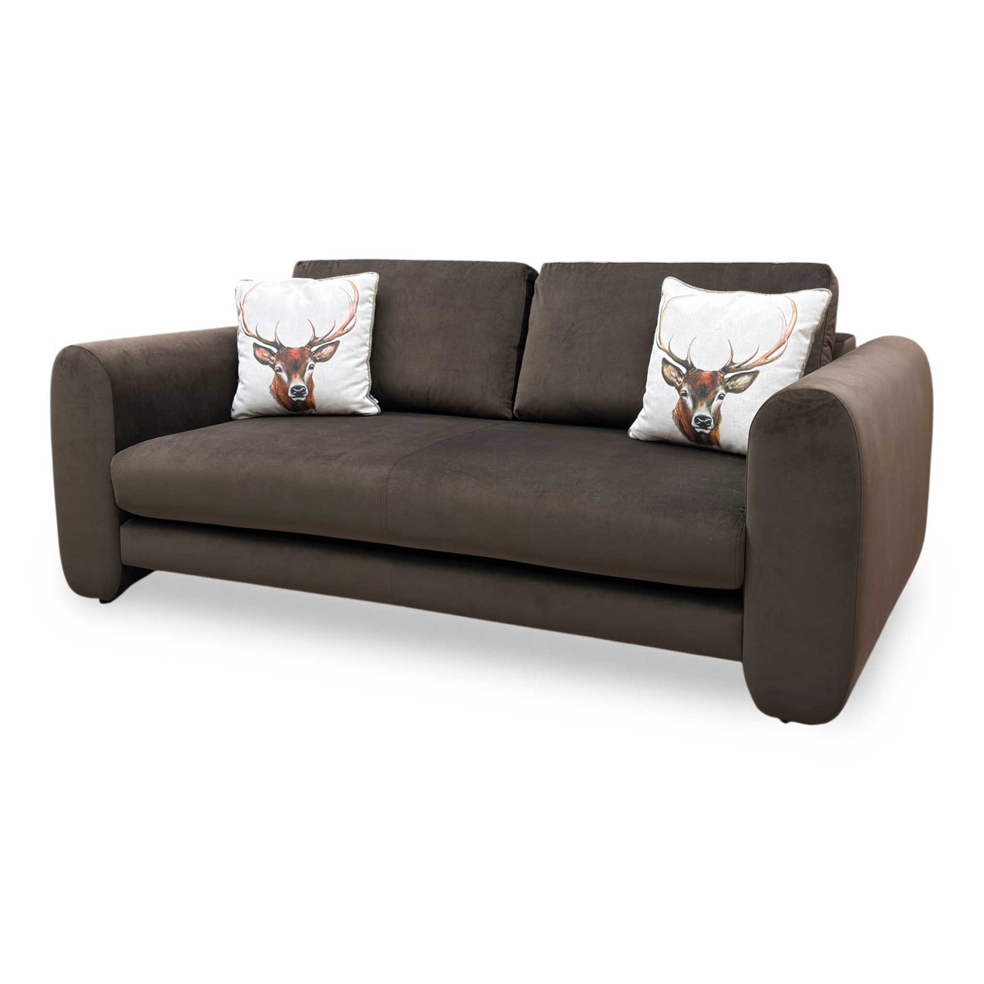 Angle view of the Stella brown velvet sofa, emphasizing its contemporary frame structure and deeply padded armrests built for premium comfort.
