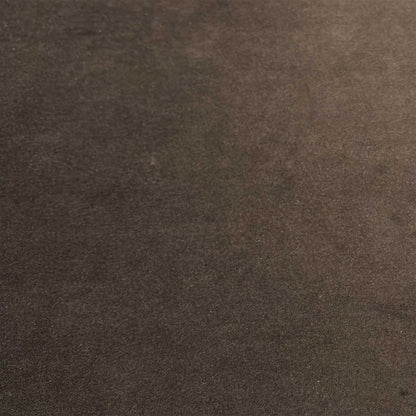 Close-up macro shot of the premium Stella brown velvet upholstery, detailing the soft touch texture, fine fiber depth, and rich warm brown color tones.