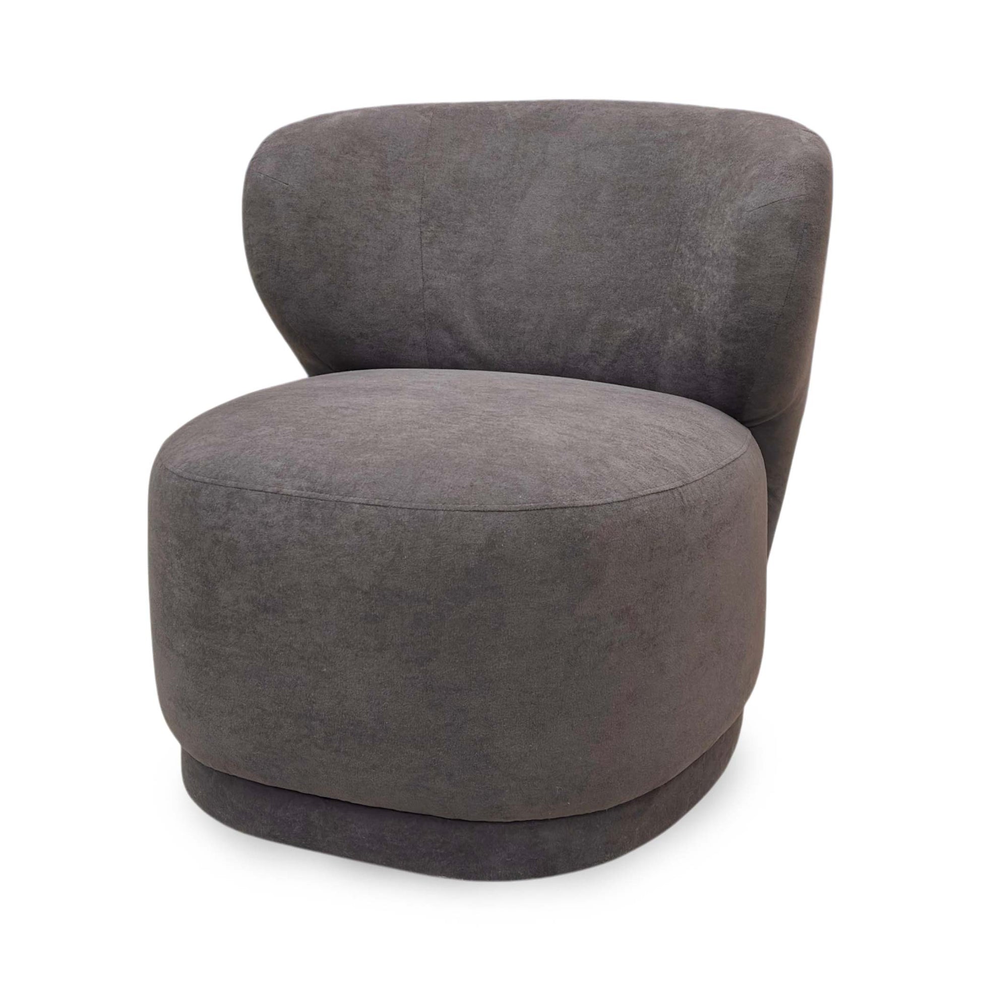 Side profile of the praline brown fabric accent chair, highlighting its compact frame depth and slightly angled backrest for reading comfort.