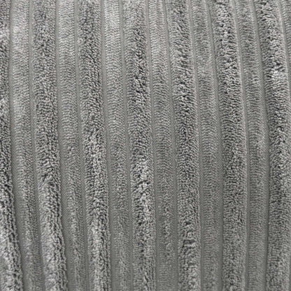 Close-up macro view of the luxury slate grey jumbo cord fabric, detailing the wide-ribbed corduroy texture and soft fiber construction.