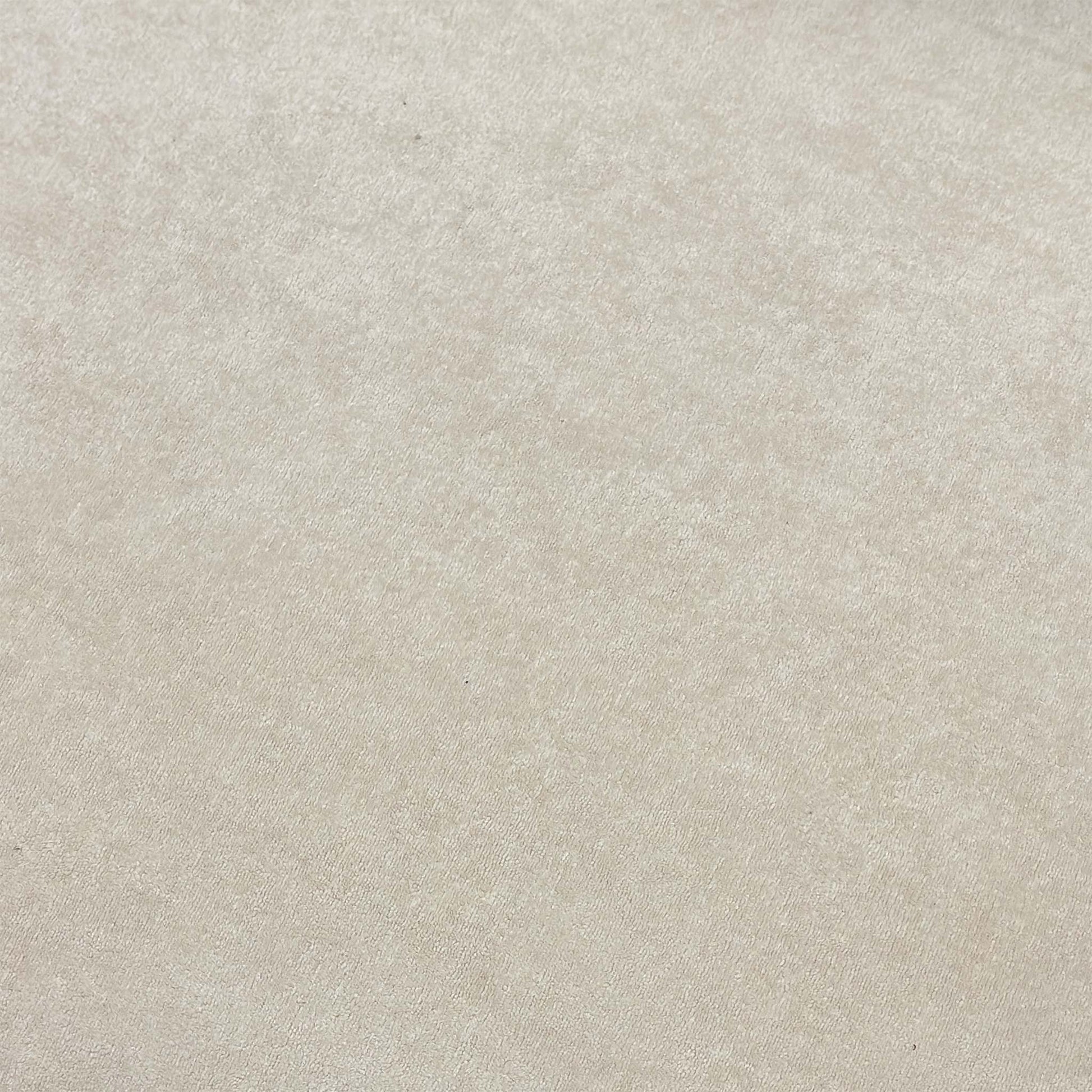 High-definition close-up macro view of the cream Palmero velvet fabric, showcasing the fine weave, clean texture, and rich luxury finish.