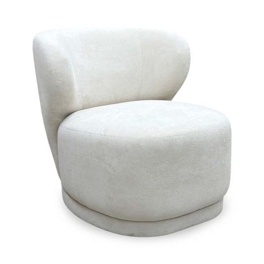 Full View DFS ‘Kalista’ contemporary accent armchair, elegantly upholstered in premium, ultra-soft cream Palmero plain velvet fabric.