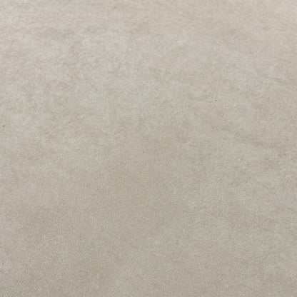 High-definition close-up macro view of the cream Palmero plain velvet textile, showing its smooth low-pile sheen and delicate neutral color tones.