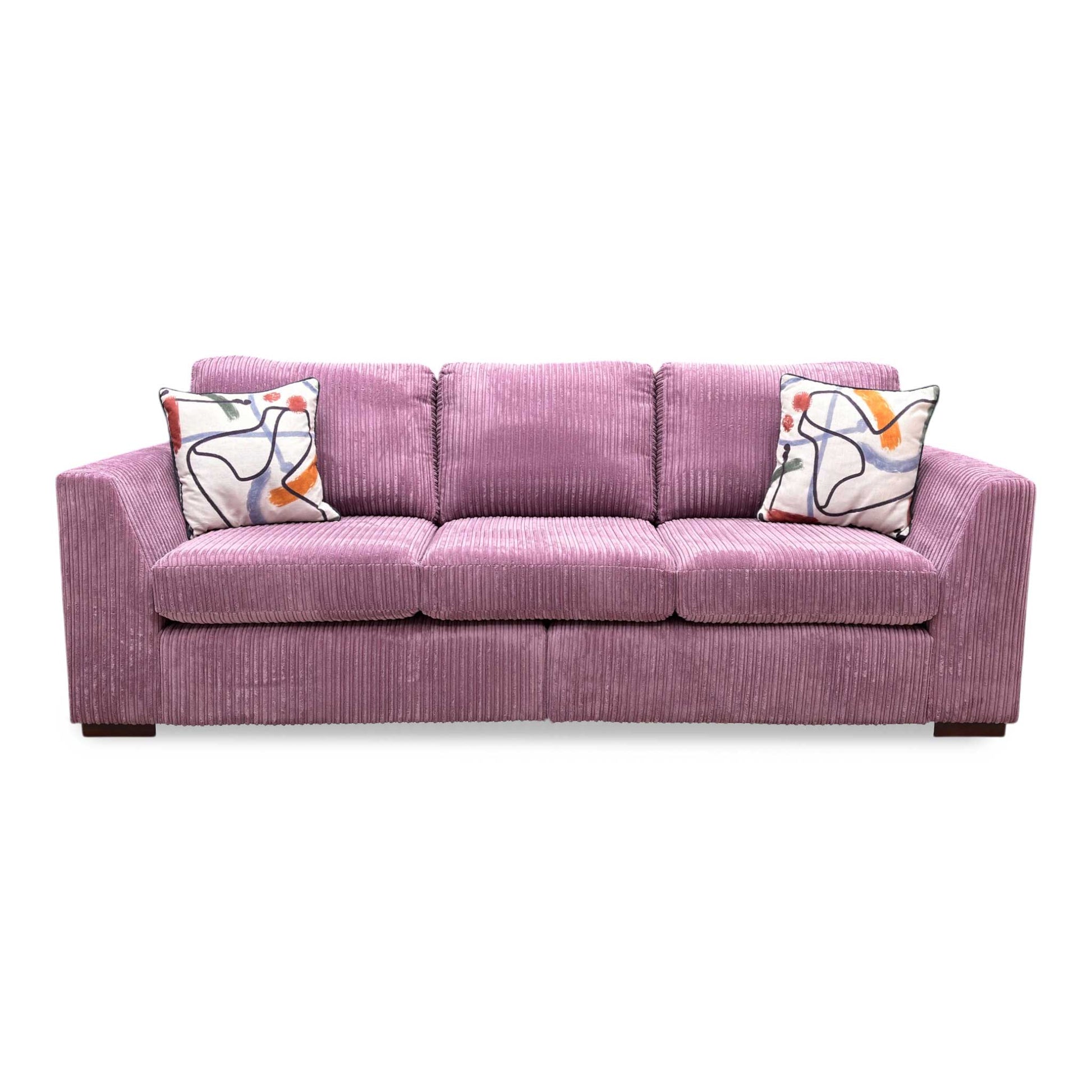Front profile look of the 4-seater jumbo cord sofa, highlighting the generous twin seat cushions, plush scatter-style back cushions, and wide track armrests.