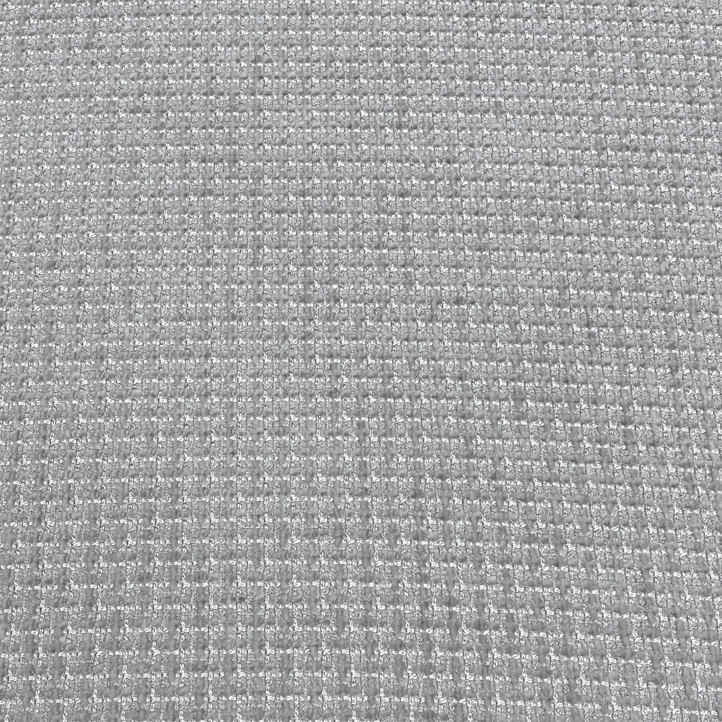High-definition close-up macro view of the silver Dawson plain fabric textile, illustrating the tightly woven, durable thread composition and neutral grey finish.