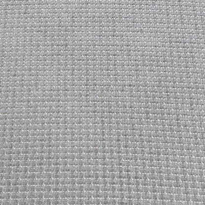 High-definition close-up macro view of the silver Dawson plain fabric textile, illustrating the tightly woven, durable thread composition and neutral grey finish.