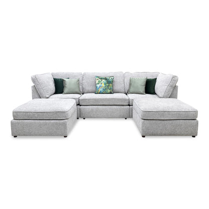 Front view of the Emilia Silver fabric, showing the fine weave that creates a multidimensional metallic look under varied indoor lighting conditions.