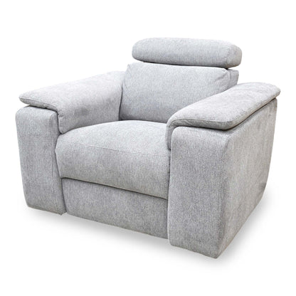 Side profile of the Nicoletti Davide armchair, emphasizing its sleek, modern lines, padded armrests, and integrated power control buttons.