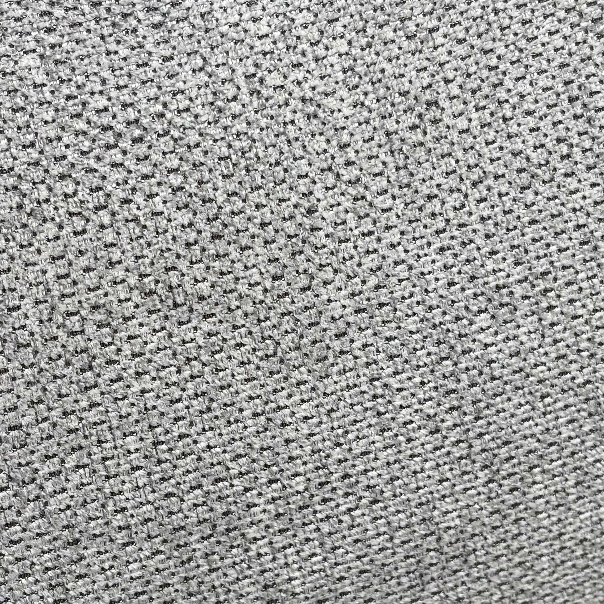 Close-up shot of the premium light grey fabric upholstery on the Nicoletti Davide chair, highlighting the fine texture, quality weave, and precise hand-stitching.