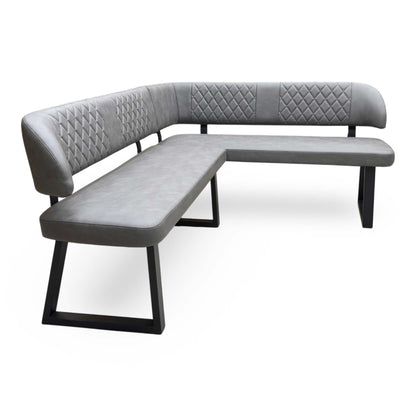 Side perspective view showing the deep foam-cushioned seating surface and premium grey faux leather stitching detail.