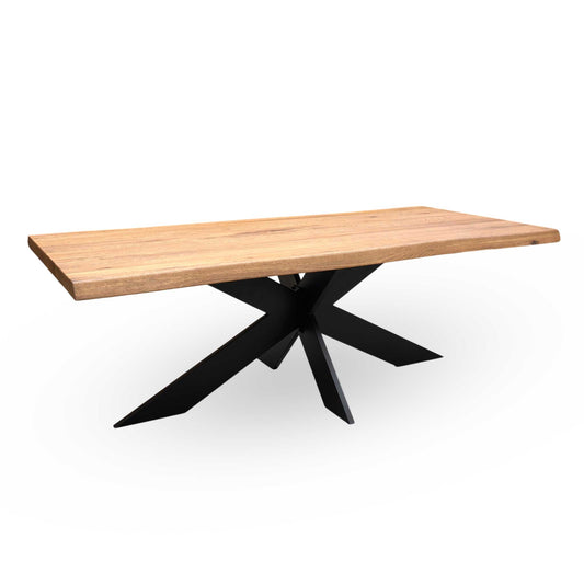 Full view of the Bodahl Terra 6 dining table, showcasing its expansive 220cm 'Old Bassano' solid oak top, organic raw edge, and central black metal star leg base.