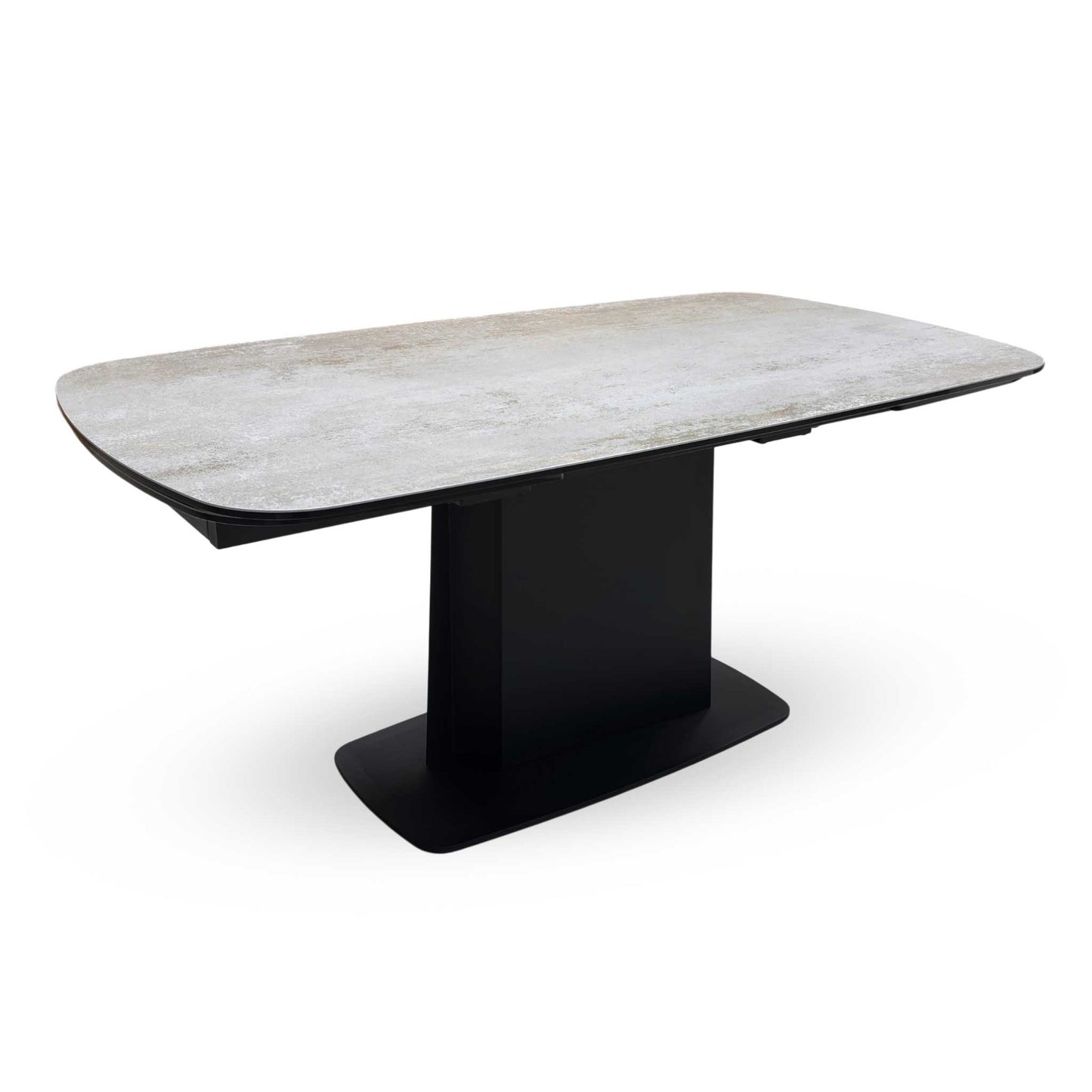 Side view of the Catalina table fully extended, showcasing the expansive surface area and the symmetrical aesthetic of the extension leaves.