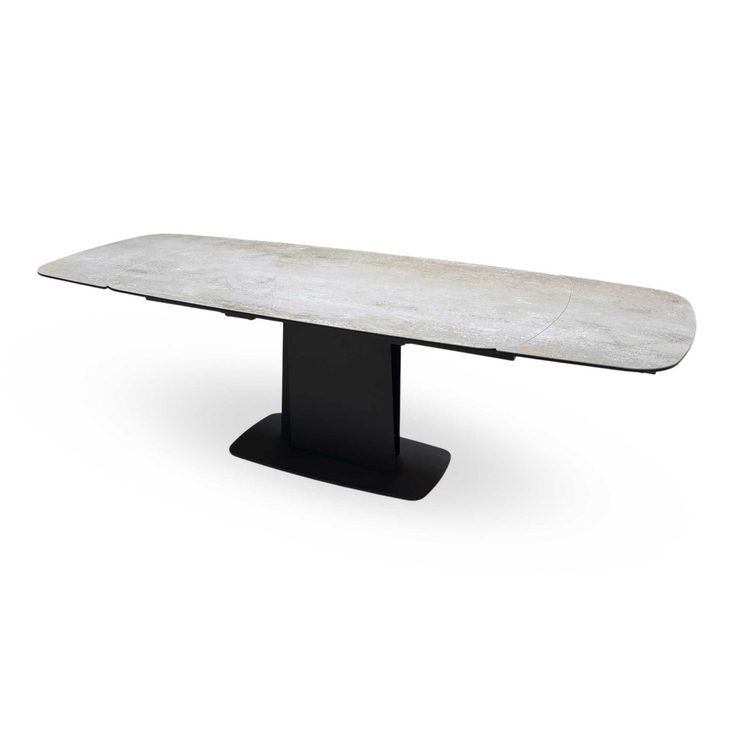 Side view of the Catalina table fully extended, showcasing the expansive surface area and the symmetrical aesthetic of the extension leaves.