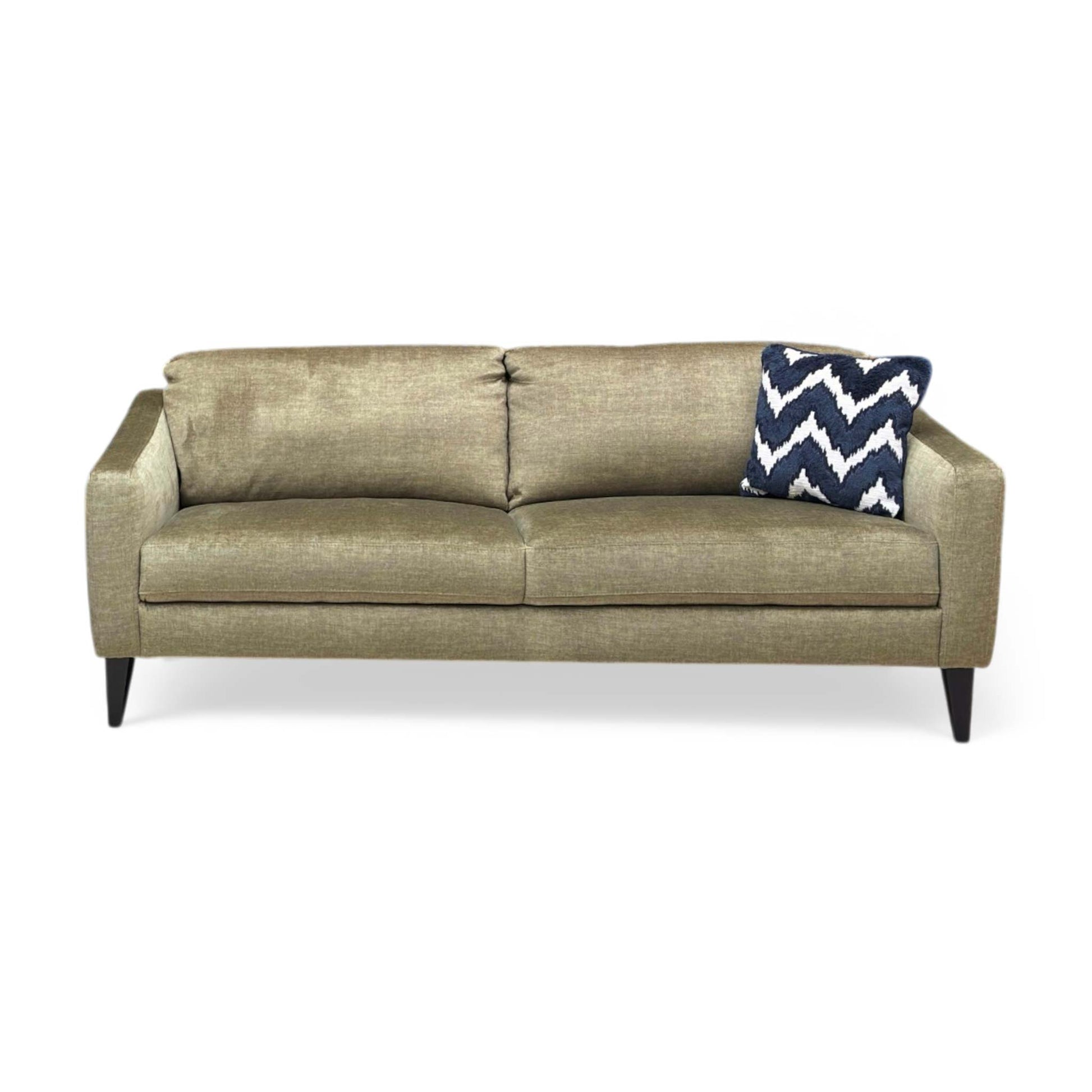 Front view shot of the stylish tapered legs, showing the sturdy support and the modern finish of the sofa's base.