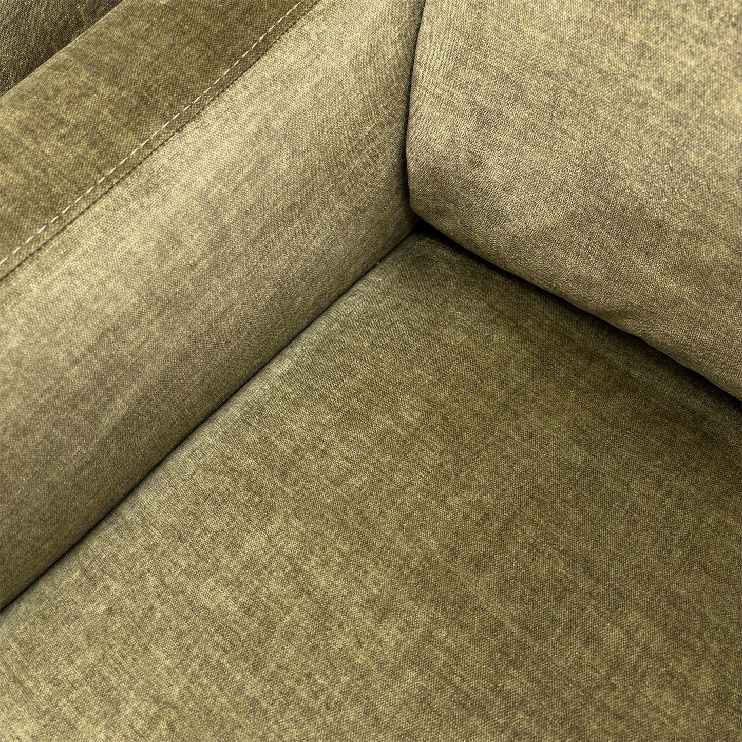 Close-up of the Vogue Olive Green velvet fabric, highlighting the rich color depth, smooth texture, and the quality of the stitching.