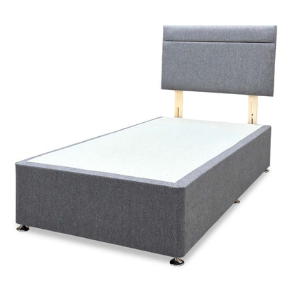 Side profile view of the single divan bed, highlighting the sleek thickness of the floor-standing headboard, the flush alignment of the storage drawers, and the clean, space-saving bedroom footprint.
