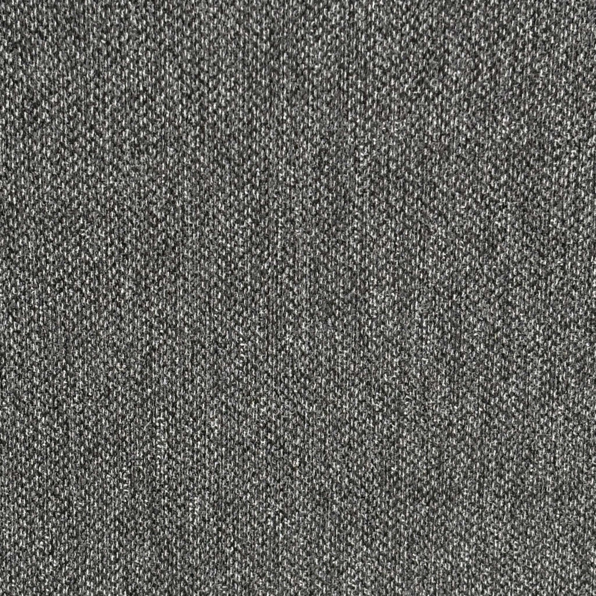 High-definition close-up shot of the Orkney charcoal fabric upholstery, detailing its thick, tightly woven multi-tonal grey textile pattern and high-quality tailored stitching.