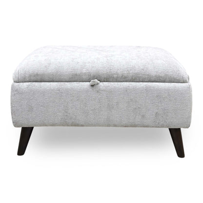 Front view of the ‘Sanremo’ Storage Footstool in Silver fabric, showcasing its elegant rectangular silhouette, deep button-tufted top cushions, and clean, contemporary tailored borders.
