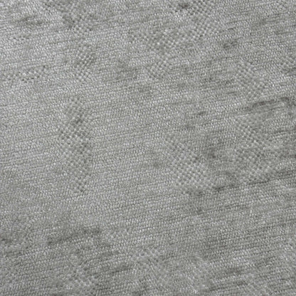 Close-up shot of the Silver fabric on the ‘Sanremo’ footstool, showcasing the rich multi-tonal grey and silver woven fibers, soft-touch texture, and high-quality stitched detailing.