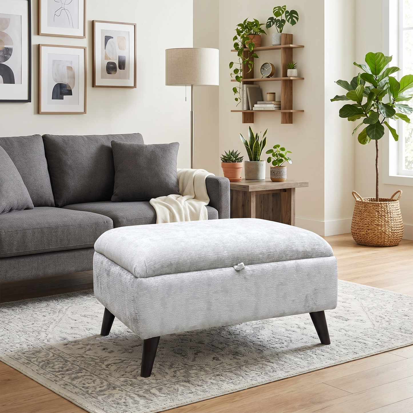 Living room view for the ‘Dior’ Forest Green fabric end ottoman bed frame, highlighting the spacious under-bed storage compartment, powerful gas-lift hydraulic system, and premium fabric finish.
