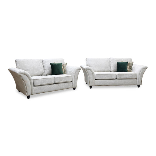 Full view of the Dury living room set, showcasing the matching 3-seater and 2-seater sofas upholstered in a premium natural beige chunky weave fabric with a standard backrest design.