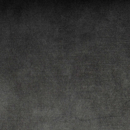 High-definition close-up shot of the coal fabric upholstery, detailing its tight, durable weave pattern, rich dark grey tonal depth, and neat, high-quality tailored seams.