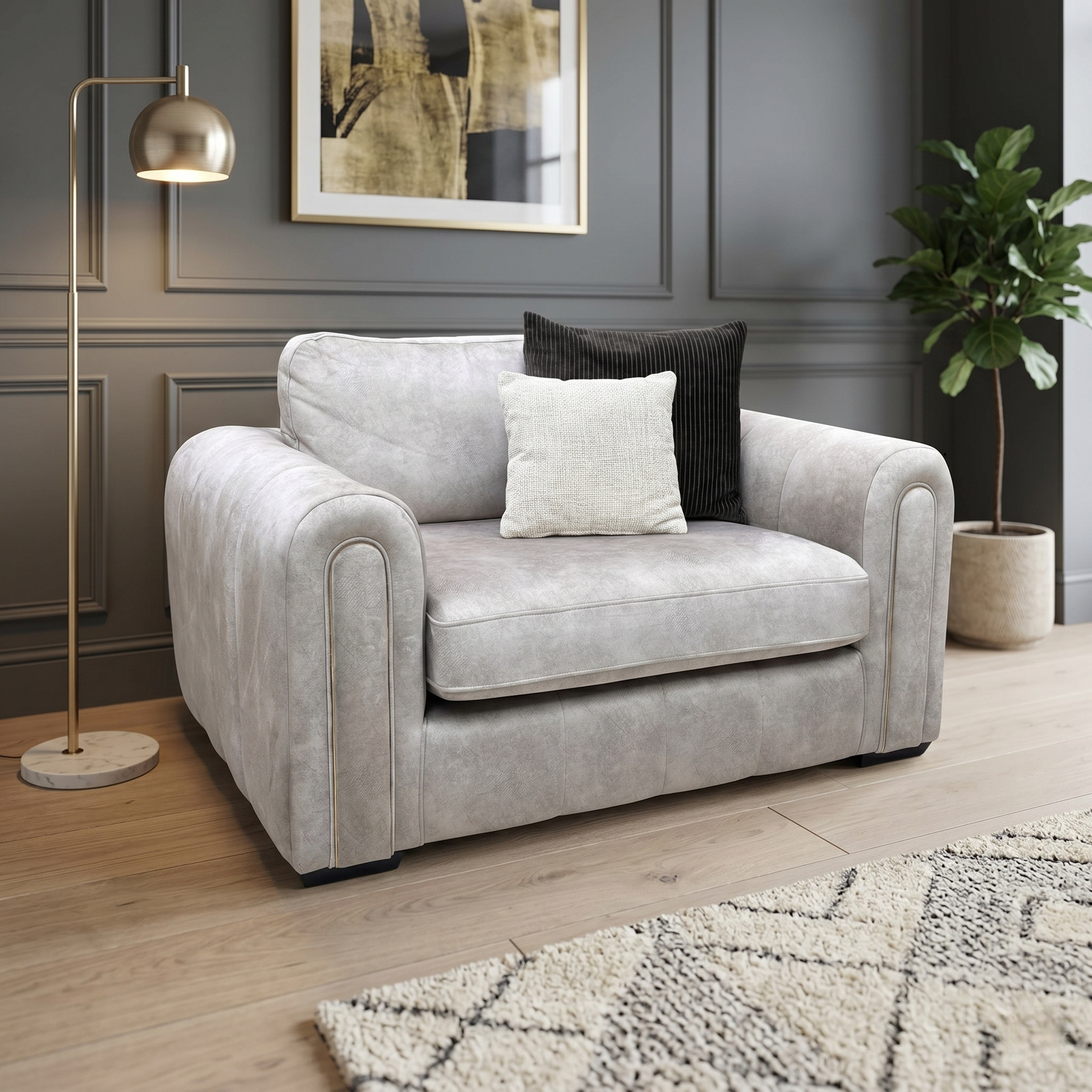 Living room view for the Amara snuggle chair, highlighting its spacious 1.5-seater design, high-density comfort foam cores, and elegant stone fabric upholstery.