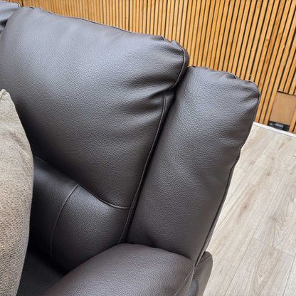 High-definition close-up shot of the chocolate brown faux leather material, detailing its realistic grain texture, soft matte finish, and clean tonal stitching along the seams.