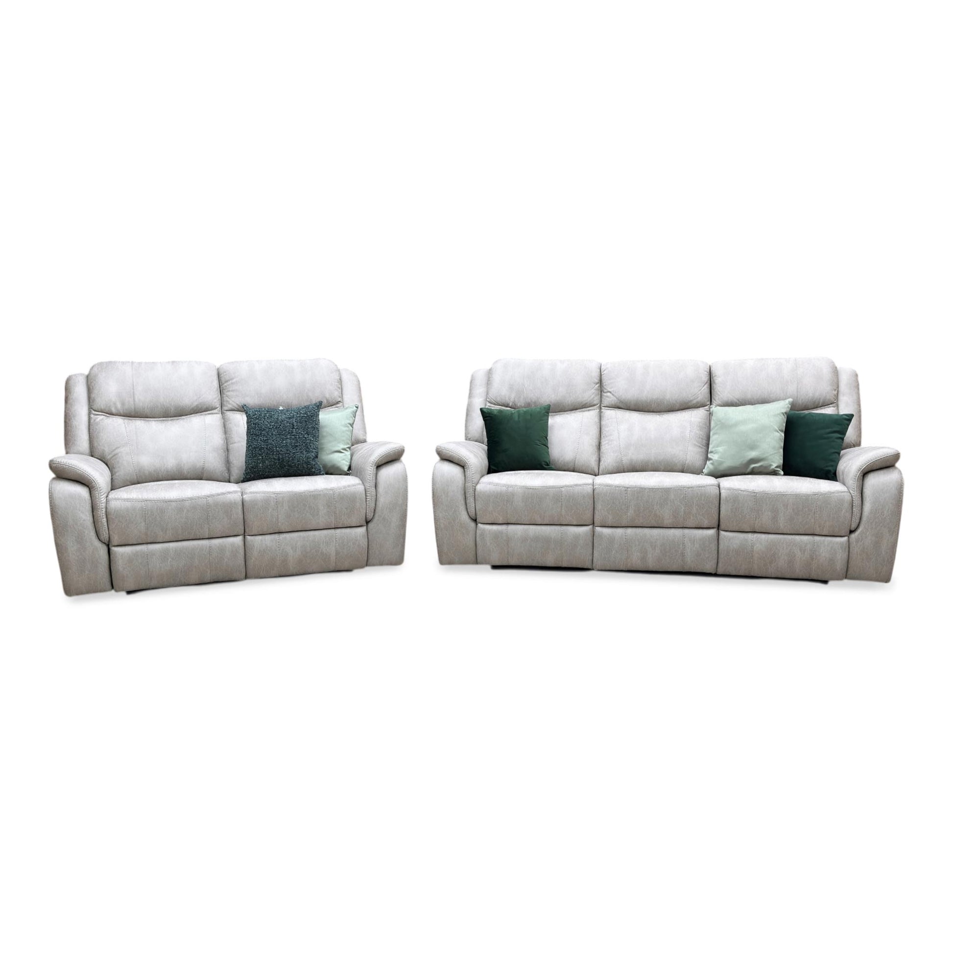 Front-facing shot of the Texas power recliner sofa suite, showcasing the matching 3-seater and 2-seater sofas in premium Stainley Stone microfibre with plush, deeply cushioned profiles.