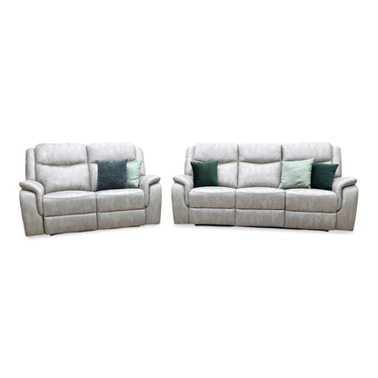 Front-facing shot of the Texas power recliner sofa suite, showcasing the matching 3-seater and 2-seater sofas in premium Stainley Stone microfibre with plush, deeply cushioned profiles.