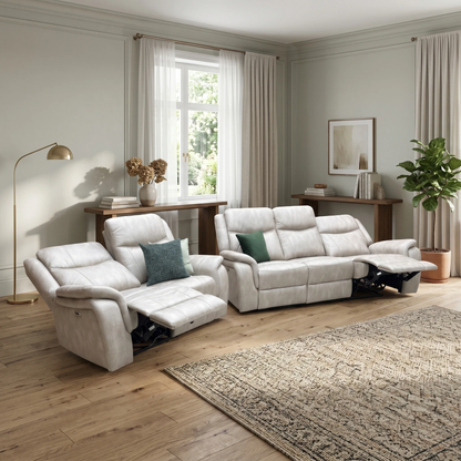 Living room view for the Texas 3+2 power recliner set, highlighting the durable stone-grey microfibre upholstery, pocket-sprung seating comfort, and smooth electric reclining controls.