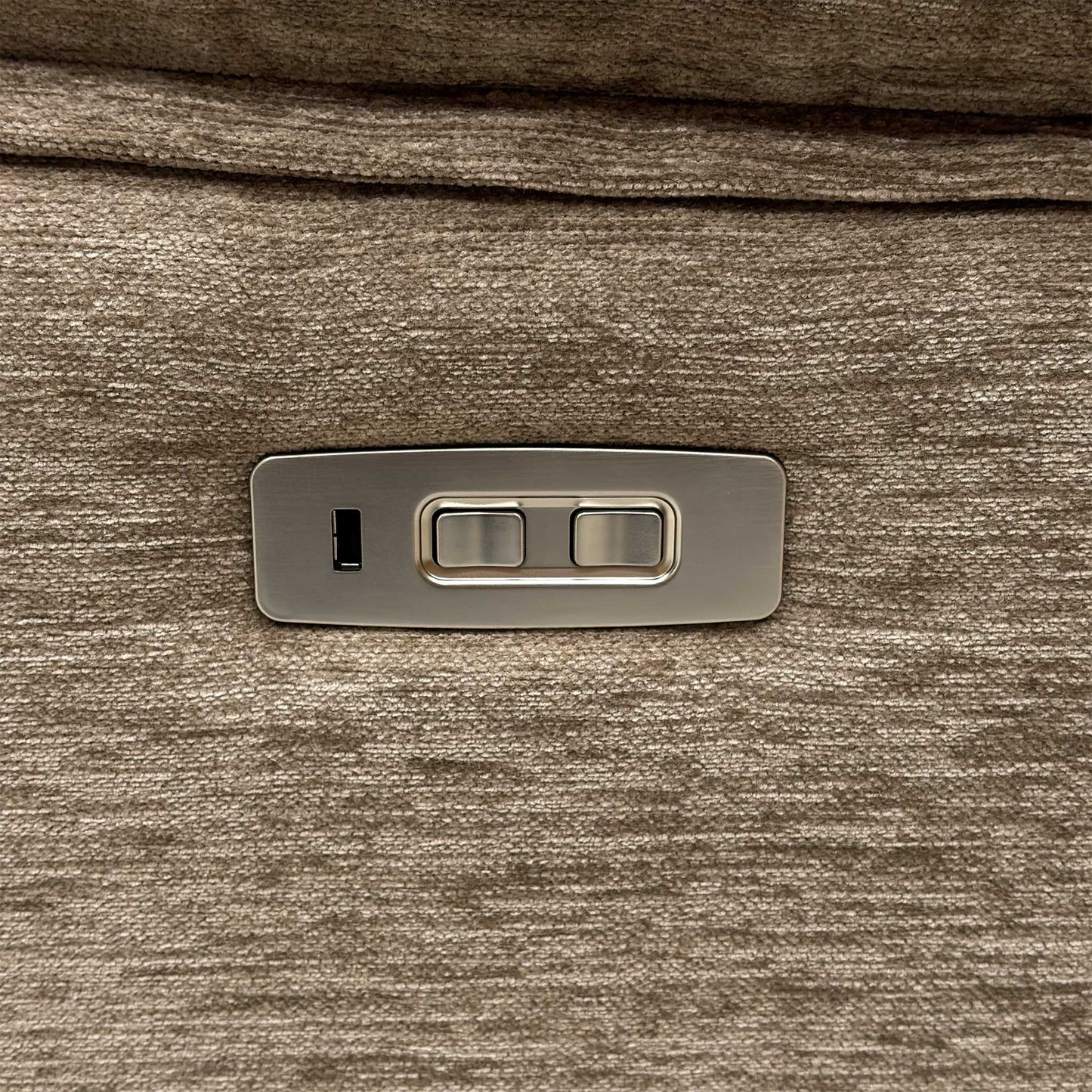 Detail shot of the integrated metallic power touch control switches on the side panel, featuring smooth reclining activation and a built-in USB port for convenient device charging.