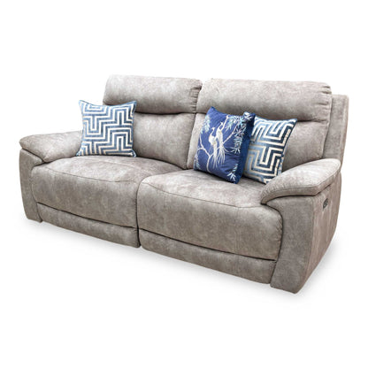 Side profile of the ‘Sloane’ power recliner sofa, highlighting the ergonomic curvature of the high backrest, cushioned armrests, and wall-clearance requirements when fully reclined.